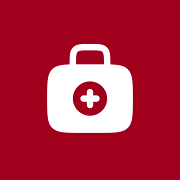 White medical first aid kit icon with a cross in a red square.