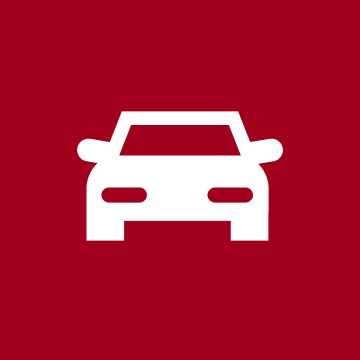 White car icon on a red background.